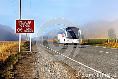 Coach Bus on Mountain Road, New Zealand Editorial Stock Photo