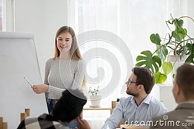 Coach and business people at seminar indoors Stock Photo