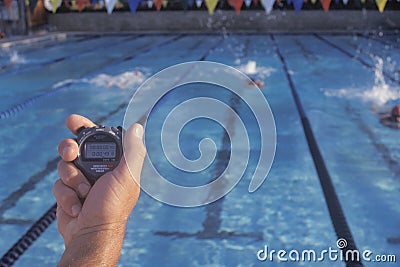 Coach timing swimmers, Editorial Stock Photo