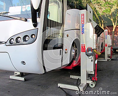 Coach up in the air being repaired Editorial Stock Photo