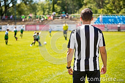 Coach of Youth Soccer Team. Coaching Football Soccer Kids. Soccer Practice Match on the Pitch. Coaching Youth Soccer Editorial Stock Photo