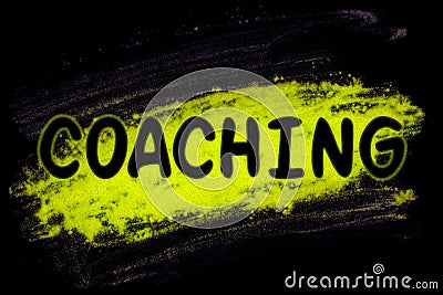 Coaching word with glow powder Stock Photo