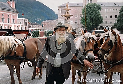 Coachman and Horses in Salzburg, Austria Editorial Stock Photo