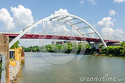 Coal barge being pushed up te CUmberland River near Downtown Nashville Stock Photo