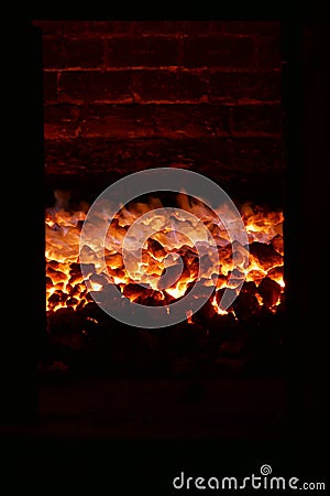 Coal fire in a brick kiln Stock Photo