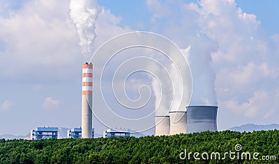 Coal fired electric power plant with agriculture field landscape. Hongsa city, Laos Stock Photo