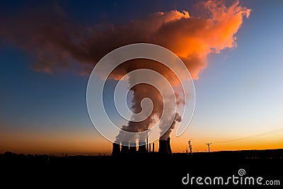 Coal fired power station and Combined cycle power plant at sunset, Pocerady, Czech republic Stock Photo