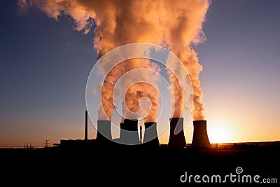 Coal fired power station and Combined cycle power plant at sunset, Pocerady, Czech republic Stock Photo