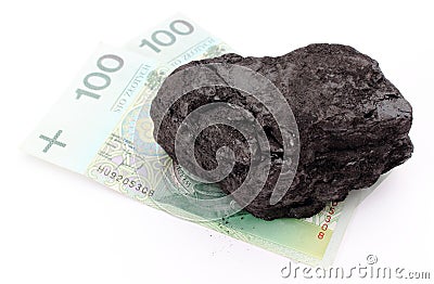 Coal lump with money on white background Stock Photo