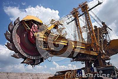 coal mining coal machine under cloudy sky Stock Photo