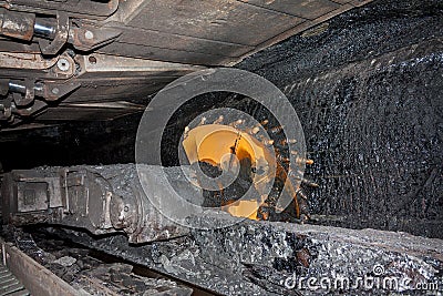 Coal mining machine with rotating cutting drums Stock Photo