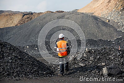 Coal mining in an open pit Stock Photo