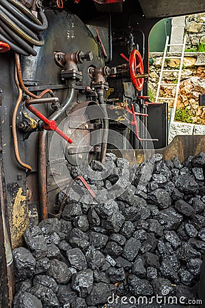Coal pile in steam locomotive Stock Photo