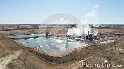Power Plant and Coolant Ponds with Steam in Eastern Colorado Stock Photo