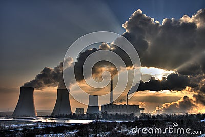 Coal powerplant view - chimneys and fumes Stock Photo