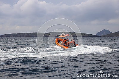 The coast guard boat conducts inspection in the Aegean Sea. Editorial Stock Photo