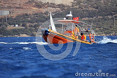 The coast guard boat conducts inspection in the Aegean Sea. Editorial Stock Photo