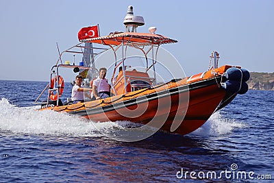 The coast guard boat conducts inspection in the Aegean Sea. Editorial Stock Photo