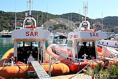 Coast guards in the harbour of Porto Santo Stefano, Italy Editorial Stock Photo