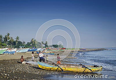 Traditional fishing boats on dili beach in east timor leste Editorial Stock Photo