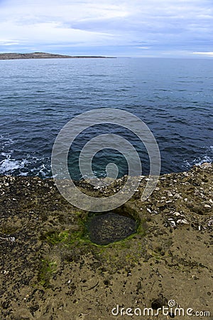 Coastal landscape with cliffs in Peninsula Valdes, Stock Photo