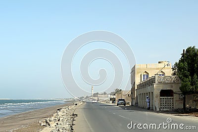 The coastal road and beach at Al Khabourah in the Batinah region of Oman Editorial Stock Photo