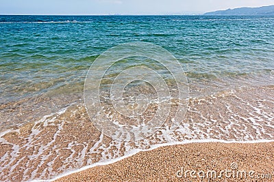 Coastal sea waves on a sandy beach. Sea summer landscape Stock Photo