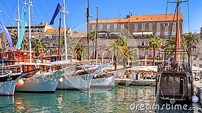 Coastal summer cityscape - view of the promenade the Old Town of Split with the Palace of Diocletian and the marina Editorial Stock Photo