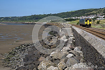 Coastal Train and Railway Line, Millennium Coastal Path, Llanelli, South Wales Stock Photo