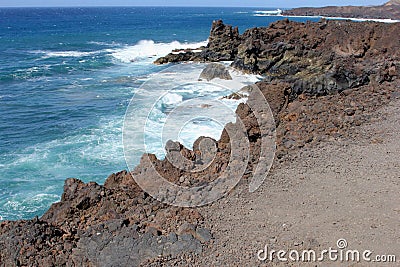 Coastal view lava rocks Atlantic Ocean, Lanzarote, Spain Stock Photo