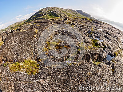 Coastline of Barents sea in northern polar summer. Arctic ocean, Kola Peninsula, Russia. Fish eye lens Stock Photo