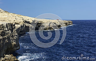 Coastline in Gozo island, Malta, Europe. Coastline near Marsalforn, village on the north coast of Gozo, the second largest island Stock Photo