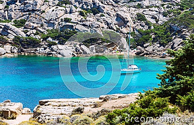 Coastline with lonely yacht in Sardinia Stock Photo