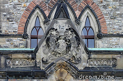 Coat of Arms sculpture above the entrance of East Block Parliament Buildings Stock Photo