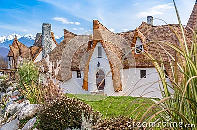 Cob clay house and garden Editorial Stock Photo