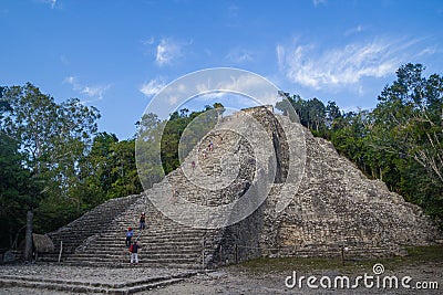 Turists climbing on Nohoch Mul Pyramid in Coba Editorial Stock Photo
