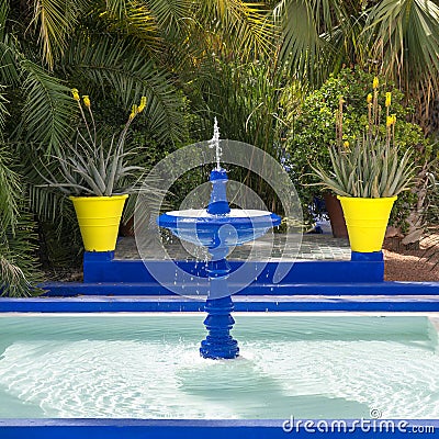 Cobalt blue fountain in the Jardin Majorelle in Marrakesh, Morocco. Stock Photo