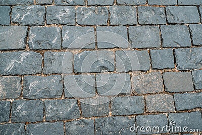 Cobbles texture background, old grunge stone blocks floor surface Stock Photo