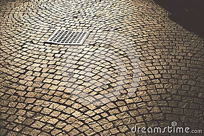 Cobblestone pavement hatch Stock Photo