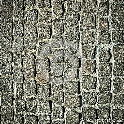 Cobblestone pavement texture background. Detail of granite sidewalk. Top view of stone road. Square or street cobblestones for Stock Photo