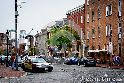 Cobblestone street in Fells Point, Baltimore, Maryland. Editorial Stock Photo