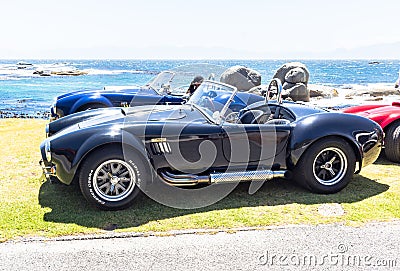 Cobra Shelbys parked near Simon`s Town ready to take sight seers and adrenaline junkies for a drive around the Cape Peninsula Editorial Stock Photo