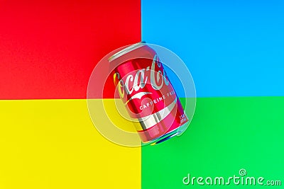 Coca - Cola carbonated soft drink on colorful background Editorial Stock Photo