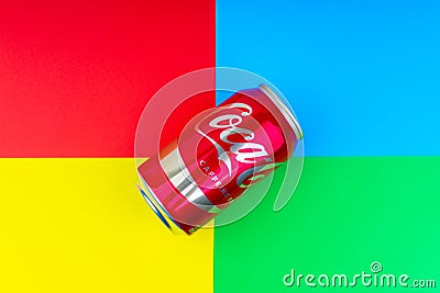 Coca - Cola carbonated soft drink on colorful background Editorial Stock Photo