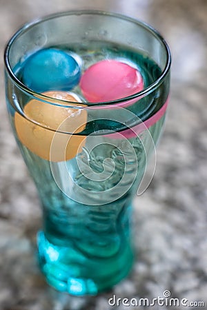 Blue green Cola glass with ice cubes Editorial Stock Photo