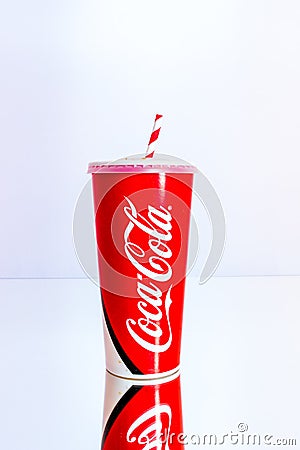 Coca Cola paper cup. Illustrative editorial photo in studio in Bucharest, Romania, 2021 Editorial Stock Photo