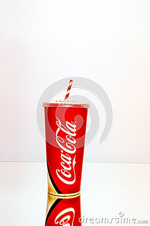 Coca Cola paper cup. Illustrative editorial photo in studio in Bucharest, Romania, 2021 Editorial Stock Photo