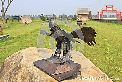 a gold comb. Sculpture made of iron. Tourist Complex Siberian Podvorye. Editorial Stock Photo