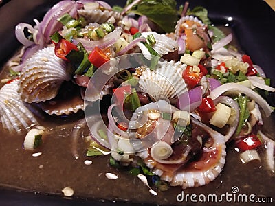 Cockles salad thaifood and Spicy food Stock Photo