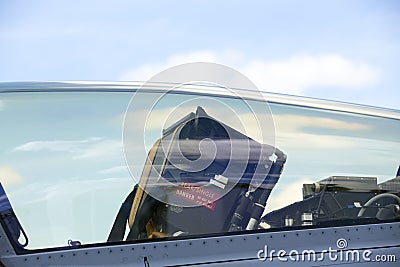 Cockpit of a tactical jet fighter with seat Stock Photo